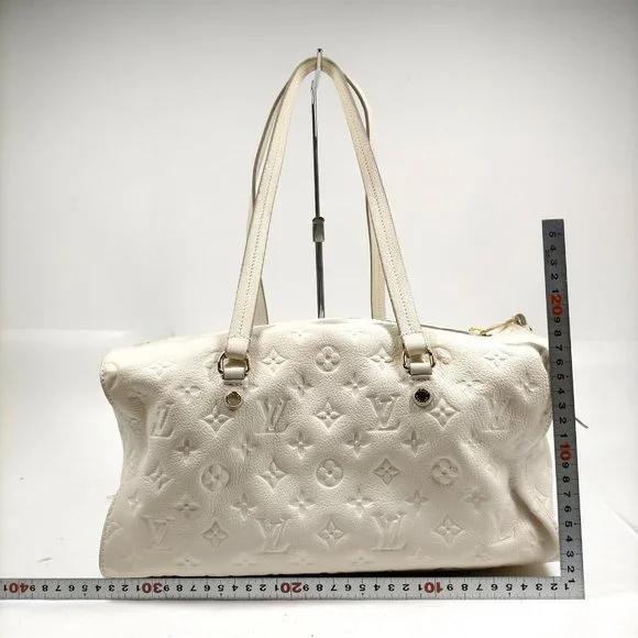 authentic LOUIS VUITTON White Monogram Empreinte Leather Inspiree Bag - Picture 5 of 16